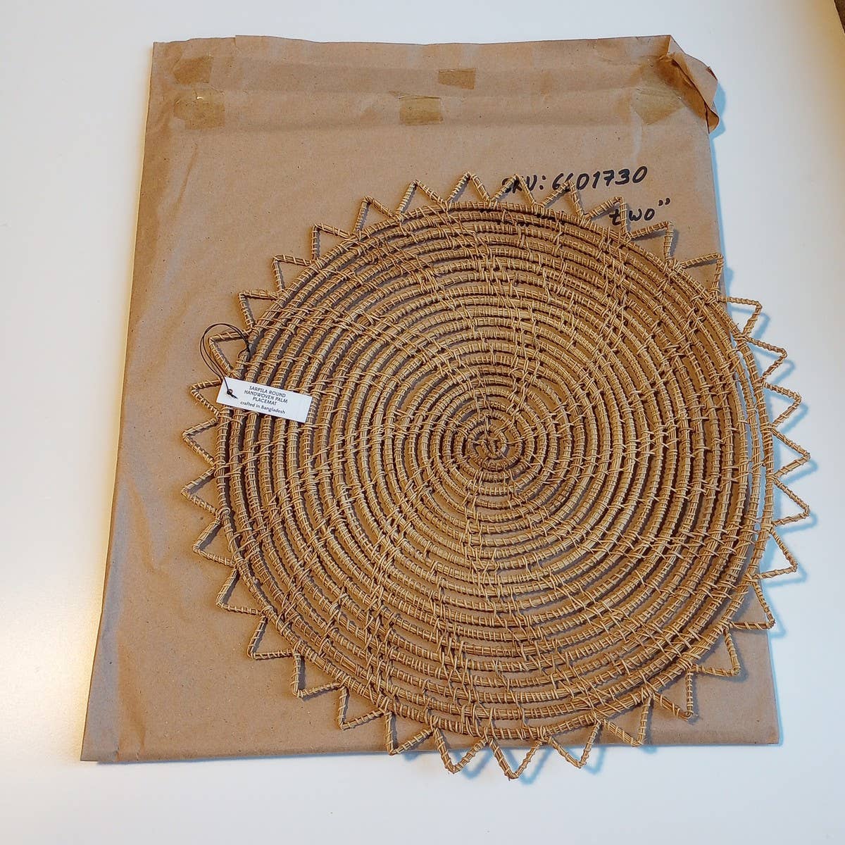 Sarpila Round Handwoven Palm Placemat